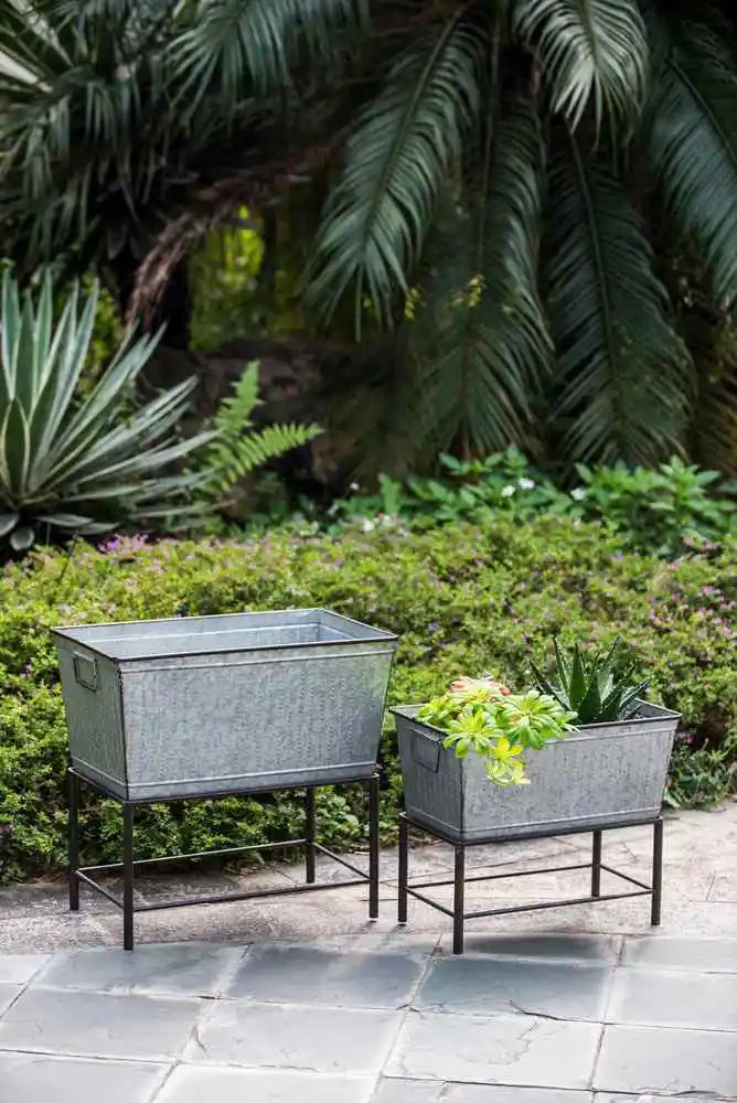 Set of 2 Zale Rustic Metal Planters with Stands, L:20x12x19.5" S:16.5x9.5x14.5"