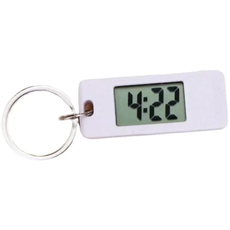 2025 Mini Electronic Clock Keychain - Elliptical, Digital Display. Ideal for students. Features LED time readout