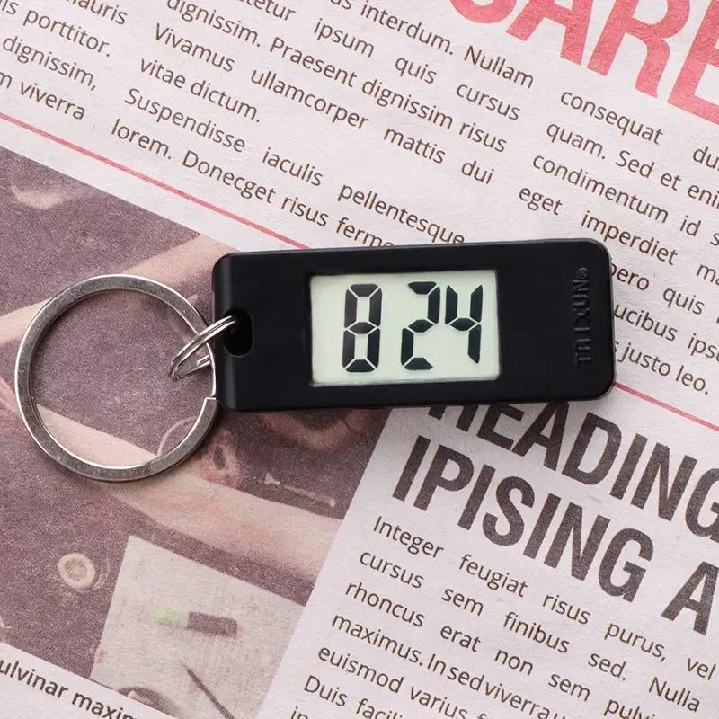 2025 Mini Electronic Clock Keychain - Elliptical, Digital Display. Ideal for students. Features LED time readout
